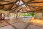 The large, covered gathering space is wonderful for a full day by the pool